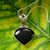 Onyx pendant necklace, 'Enigma' - Fair Trade Sterling Silver Onyx Pendant Necklace thumbail