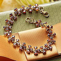 Gold plated garnet link bracelet, 'Sisodia' - Handcrafted Gold Plated Garnet Bracelet