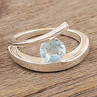 Blue topaz solitaire ring, 'Dazzling Love' - Sterling Silver Solitaire Blue Topaz Ring
