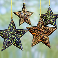 Wood Christmas ornaments, 'Starry Night' (set of 4) - Fair Trade Star Shaped Christmas Ornaments (set of 4)