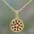 Gold plated pendant necklace, 'Circle of Flowers' - Gold Openwork Floral Pendant Necklace from India thumbail