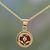 Gold plated pendant necklace, 'Floral Disc' - Gold Plated Silver Floral Pendant Necklace from India thumbail