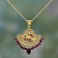 Gold plated garnet pendant necklace,
