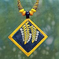 Cotton and ceramic pendant necklace,