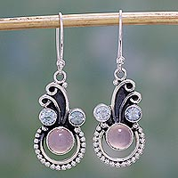 Blue topaz and chalcedony dangle earrings, 'Spiral Burst' - Blue Topaz and Chalcedony Dangle Earrings by Indian Artisans