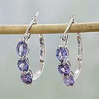 Rhodium plated tanzanite and topaz hoop earrings,
