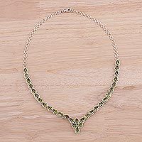 Rhodium plated peridot pendant necklace,