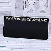 Embroidered clutch,