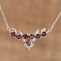 Rhodium plated garnet pendant necklace, 'Regal Scarlet' - Rhodium Plated Garnet and Silver Pendant Necklace from India