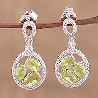 Rhodium plated peridot and white topaz dangle earrings,