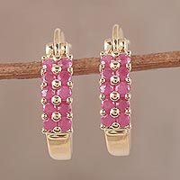 Gold plated ruby hoop earrings,