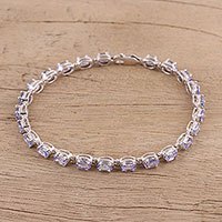 Rhodium plated tanzanite tennis style bracelet,
