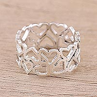 Sterling silver band ring, 'Harmony of Hearts' - Sterling Silver Heart Motif Band Ring Handcrafted in India