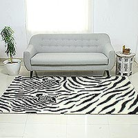 Hand-tufted wool area rug, 'Zebra Buddies' - Black and Ivory Two Zebras Hand Tufted Wool Area Rug