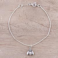 Sterling silver charm bracelet,