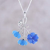 Quartz pendant necklace, 'Fascinating Blossoms' - Floral Blue Quartz Pendant Necklace from India