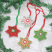 Wool felt ornaments, 'Festive Snowflakes' (set of 4) - Embroidered Wool Snowflake Ornaments from India (Set of 4)