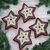Wool felt ornaments, 'Folk Art Stars' (Set of 4) - Set of Four Wool Felt Star Ornaments from India thumbail