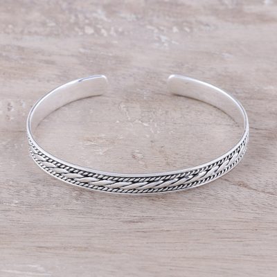 Sterling silver cuff bracelet, 'Twisting Beauty' - Twisting Motif Sterling Silver Cuff Bracelet from India