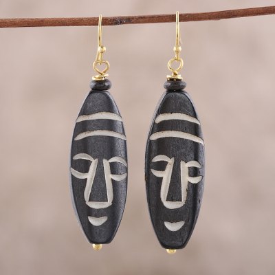 Bone dangle earrings, Delightful Masks