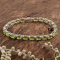 Rhodium-plated peridot tennis bracelet, 'Tennis, Anyone?' - Sparkling 22 Carat Peridot Tennis Bracelet from India