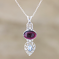 Garnet and blue topaz pendant necklace, 'Sparkling Radiance' - Garnet and Blue Topaz Sterling Silver Pendant Necklace