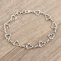 Sterling silver link bracelet, 'Symphony of Love' - Heart Themed Sterling Silver Link Bracelet Handmade in India