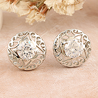 Rhodium-plated cubic zirconia button earrings, 'Radiant Swirl' - Rhodium-Plated Button Earrings with Cubic Zirconia Stones
