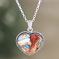 Sterling silver pendant necklace, 'Romantic Festival' - Heart-Themed Pendant Necklace with Composite Turquoise