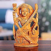 Wood sculpture, 'Divine Melody' - Hand-Carved Kadam Wood Sculpture of the Saraswati Goddess