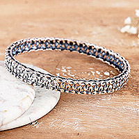 Sterling silver bangle bracelet, 'Petal Beauty' - Polished Petal-Themed Sterling Silver Bangle Bracelet