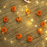 Wool felt garland, 'Happy Pumpkins' - Handcrafted Pumpkin-Themed Orange Wool Felt Garland