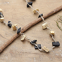 Long beaded necklace, 'Everlasting Magic' - Hand-Carved Long Beaded Necklace in Ivory and Black Hues