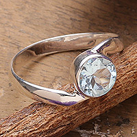 Blue topaz solitaire ring, 'Iridescent Splendor' - Polished Blue Topaz Sterling Silver Solitaire Ring