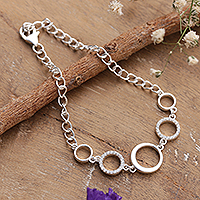 Sterling silver pendant bracelet, 'Ethereal Cycles' - Modern Sterling Silver Cubic Zirconia Pendant Bracelet