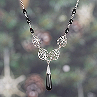 Onyx pendant necklace, 'Nocturnal Style' - Leaf-Themed Black Onyx and Sterling Silver Pendant Necklace