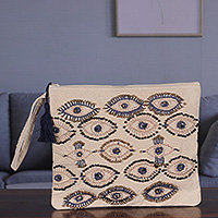 Embroidered cotton cosmetic bag, 'Beaded Gaze' - Beaded Embroidered Cotton Cosmetic Bag in Ivory and Blue