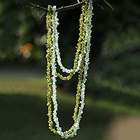 Fluorite and peridot long beaded necklaces,
