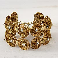Gold plated golden grass link bracelet, 'Spiral Play' - Golden Grass and Rhinestone Spiral Motif Wristband Bracelet