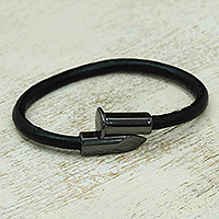 Leather cord bracelet, 'Shadow Arrow' - Epoxy-Coated Leather Cord Bracelet in Black from Brazil