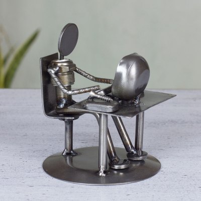Iron statuette, Rustic Computer Tech