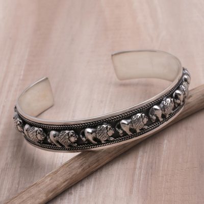 Sterling silver cuff bracelet, Lion Parade
