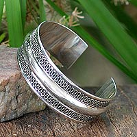 Sterling silver cuff bracelet, 'Captivated' - Hand Crafted Thai Sterling Silver Cuff Bracelet