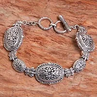Sterling silver link bracelet, 'Lotus Chain' - Sterling Silver Link Bracelet with Floral Motif