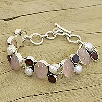 Pearl and rose quartz charm bracelet, 'A Spell of Romance' - Pearl Rose Quartz and Garnet Bracelet from India