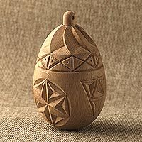 Decorative wood home accent, 'Star Amulet' - Hand Carved Beechwood Egg Home Accent