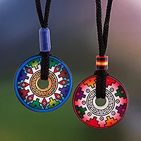 Ceramic pendant necklaces, 'You and I' (pair) - Hand Painted Pink and Blue Ceramic Pendant Necklaces (pair)