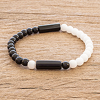 Onyx and crystal beaded stretch bracelet, 'Black and White Contrast' - Unisex Crystal and Black Onyx Stretch Bracelet