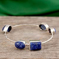 Lapis lazuli bangle bracelet, 'Depth' - Sterling Silver Bangle Bracelet with Lapis Lazuli 