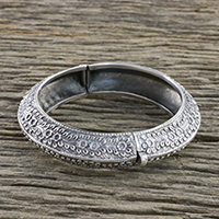Sterling silver bangle bracelet, 'Dainty Flowers' - Floral Motif Sterling Silver Bangle Bracelet from Thailand